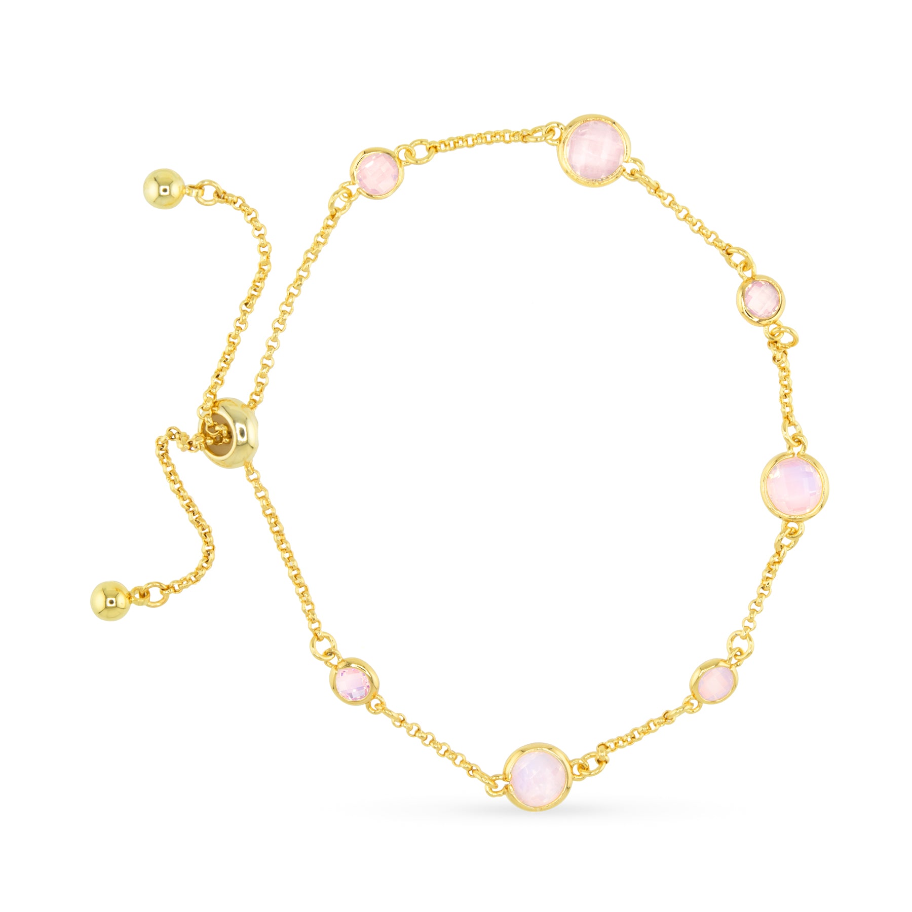 Gold bracelet with pink gemstones on a white background. Available at Be Charmed