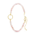 Pink Bead charm bracelet with gold clasp on a white background. Available at Be Charmed