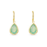 Gold earrings with green teardrop-shaped gemstones on a white background. Available at Be Charmed