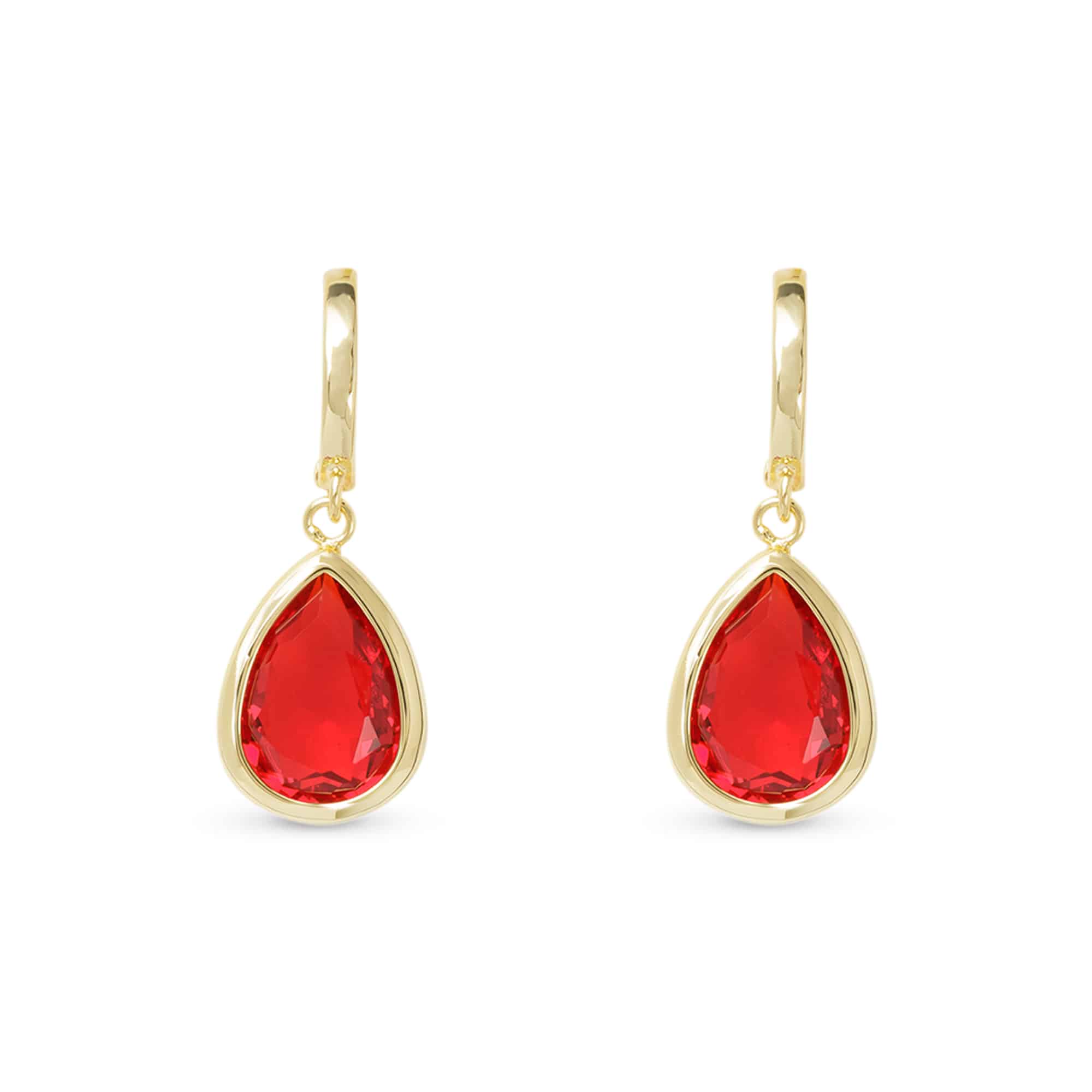 Gold earrings with red teardrop-shaped gemstones on a white background. Available at Be Charmed