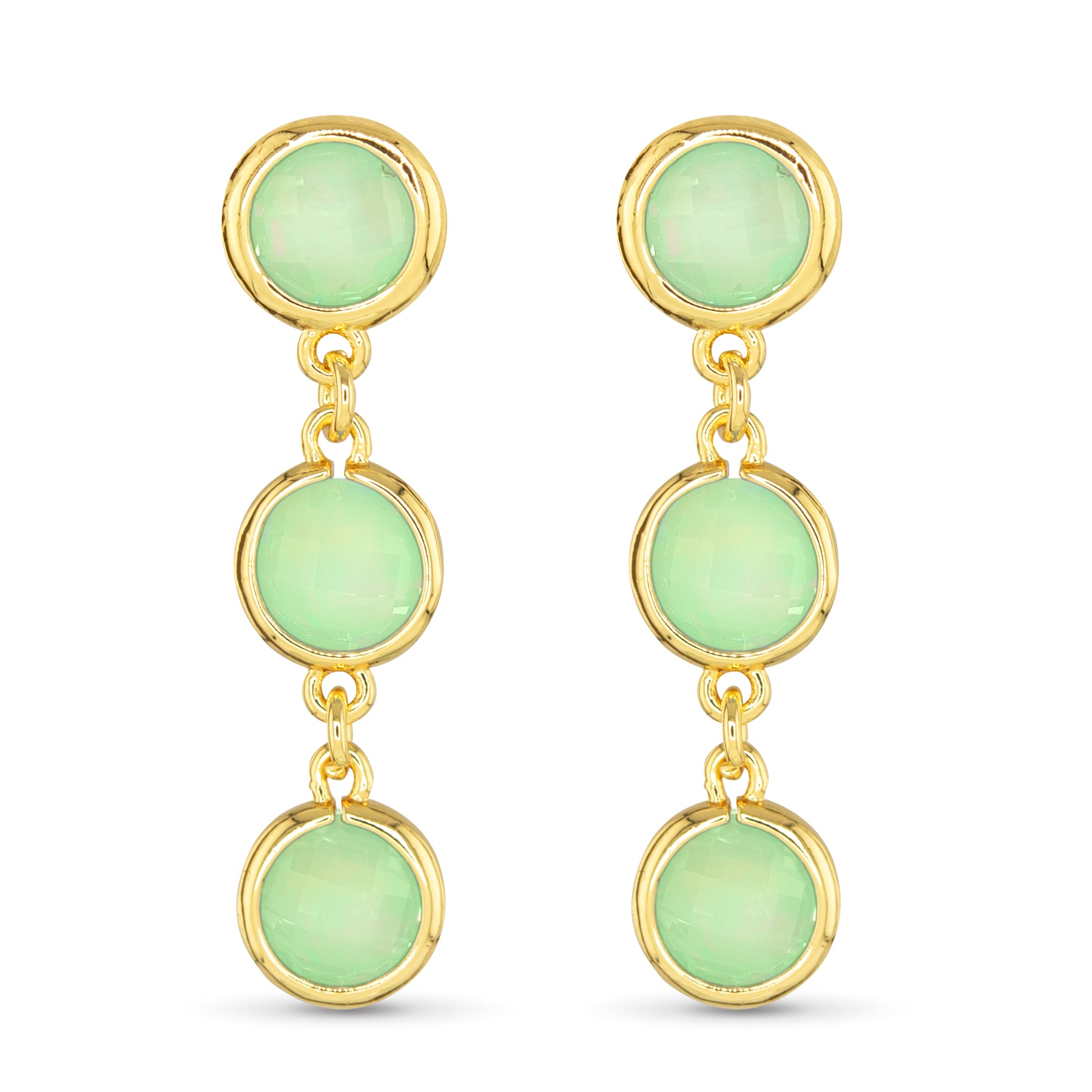 Gold earrings with green gemstones on a white background. Available at Be Charmed