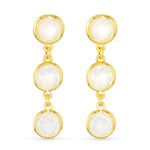 Gold earrings with white gemstones on a white background. Available at Be Charmed