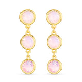 Gold earrings with pink gemstones on a white background. Available at Be Charmed