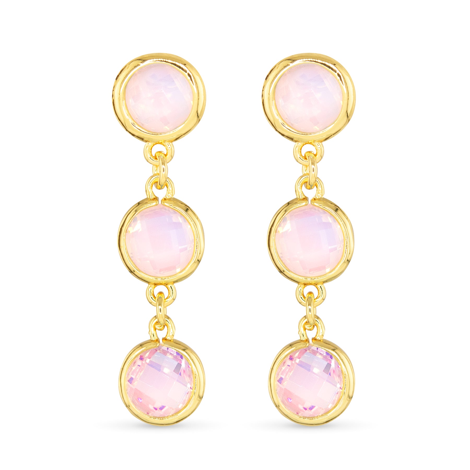 Gold earrings with pink gemstones on a white background. Available at Be Charmed