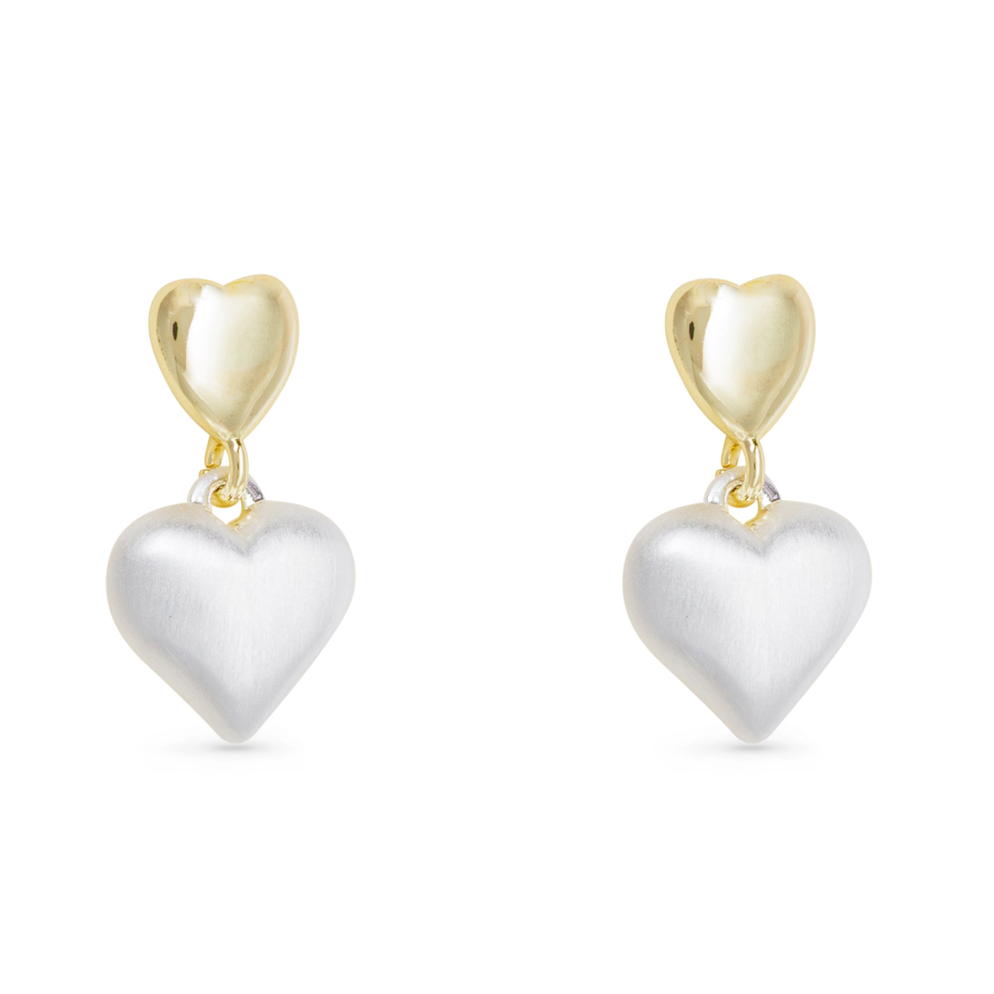Heart-shaped silver earrings with gold hooks on a white background. Available at Be Charmed