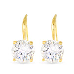 Gold drop earrings with clear gemstones on a white background. Available at Be Charmed