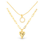 Gold Amanda Blu CZ Dual Layer Circle & Heart Necklace – 18″ chain with extender, featuring sparkling cubic zirconia circle and heart pendants. Available at Be Charmed.