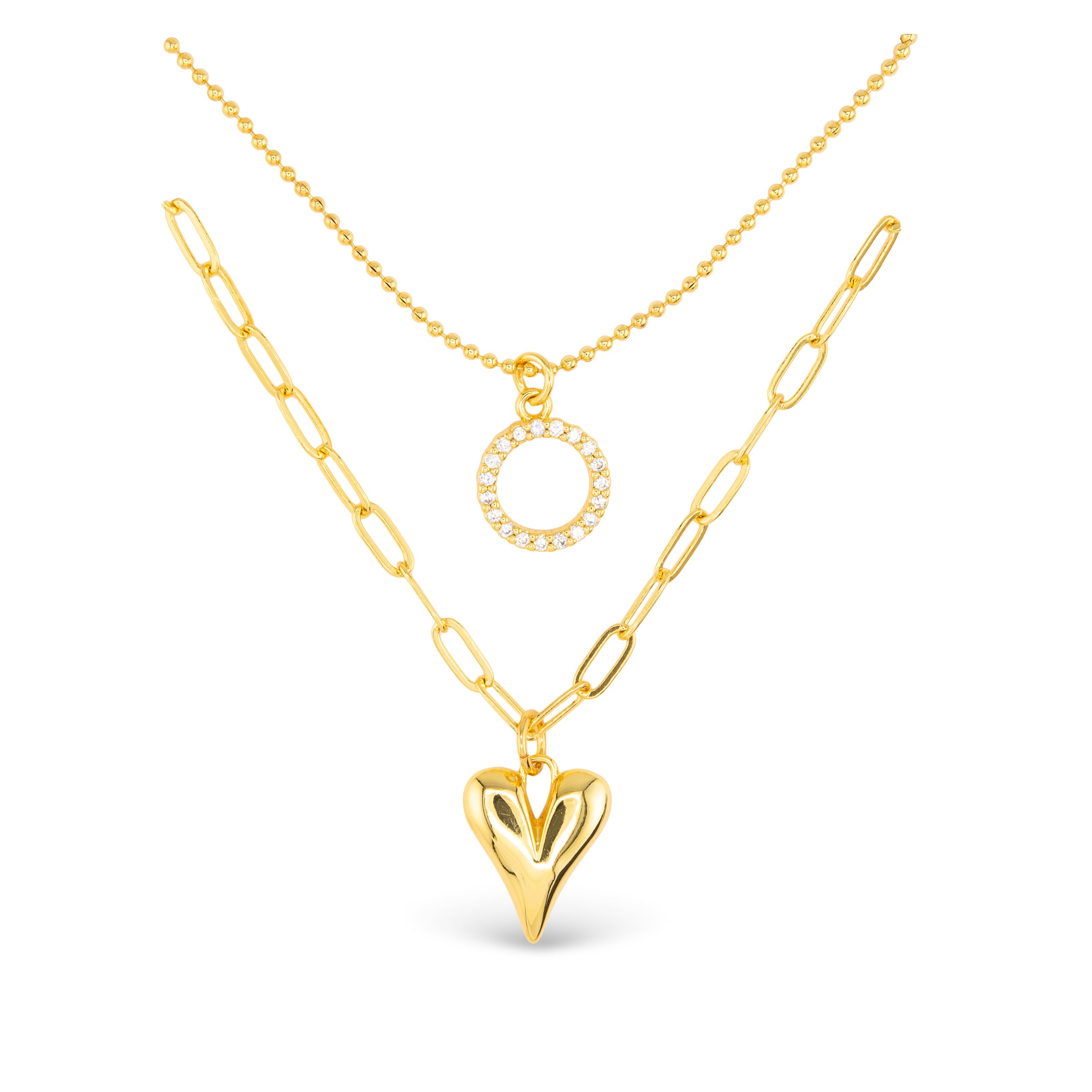 Gold Amanda Blu CZ Dual Layer Circle & Heart Necklace – 18″ chain with extender, featuring sparkling cubic zirconia circle and heart pendants. Available at Be Charmed.