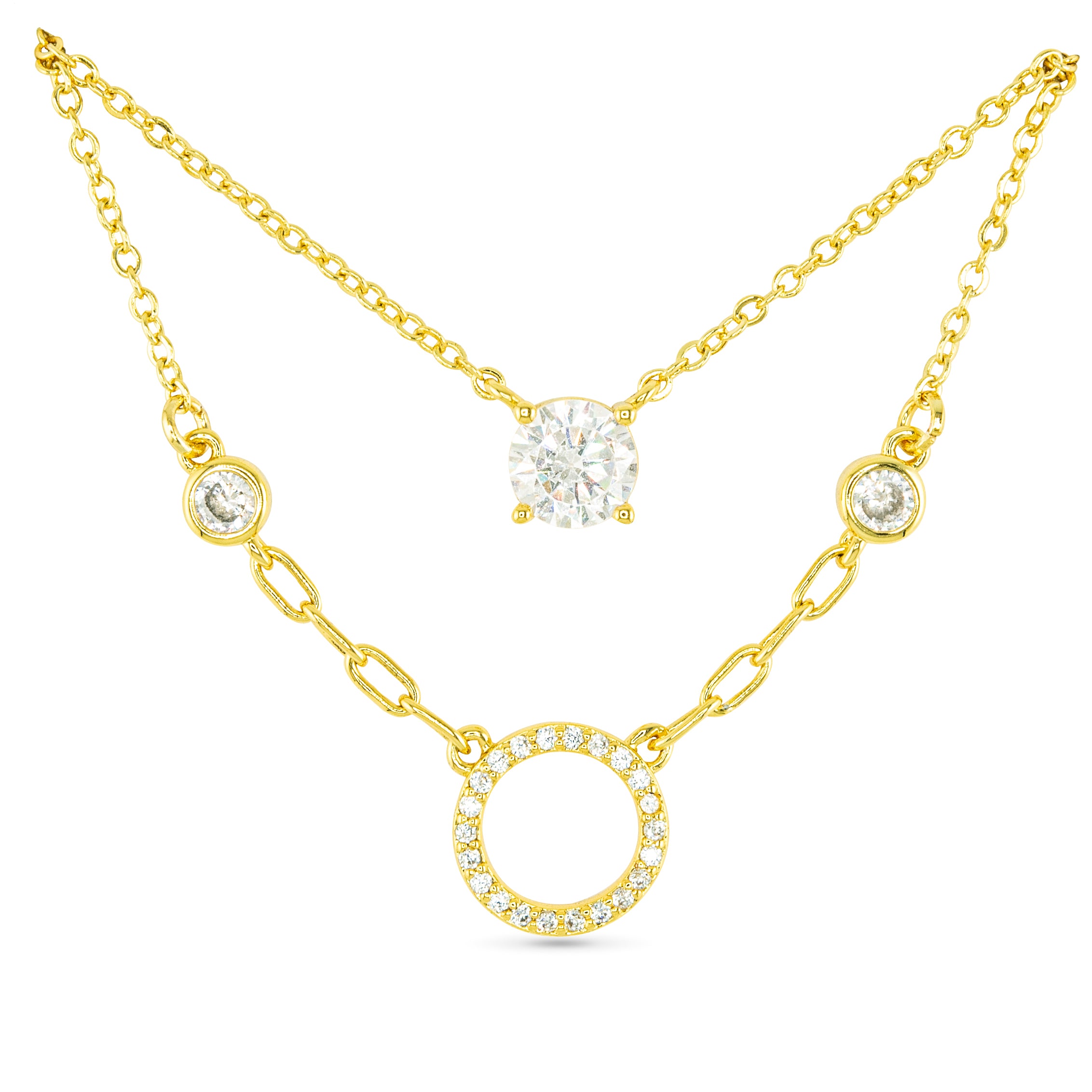 Amanda Blu Gold CZ Dual Solitaire & Circle Necklace – 18 K gold-plated chain with two sparkling CZ solitaire pendants and a clear CZ circle. Layered look, 18″ length with extender. Available at Be Charmed