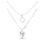 Silver Amanda Blu CZ Dual Layer Circle & Heart Necklace –  18″ chain with extender, featuring sparkling cubic zirconia circle and heart pendants. Available at Be Charmed.