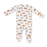 Baby onesie with dog pattern on a white background. Available at Be Charmed.