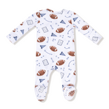 Baby onesie with football pattern on a white background. Available at Be Charmed. 