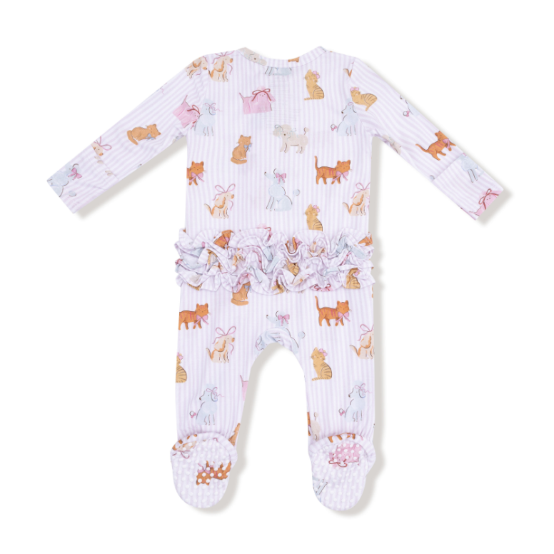 Baby onesie with animal pattern on a white background. Available at Be Charmed. 