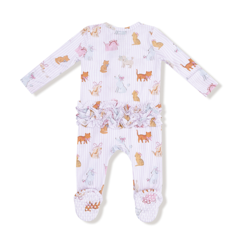 Baby onesie with animal pattern on a white background. Available at Be Charmed. 