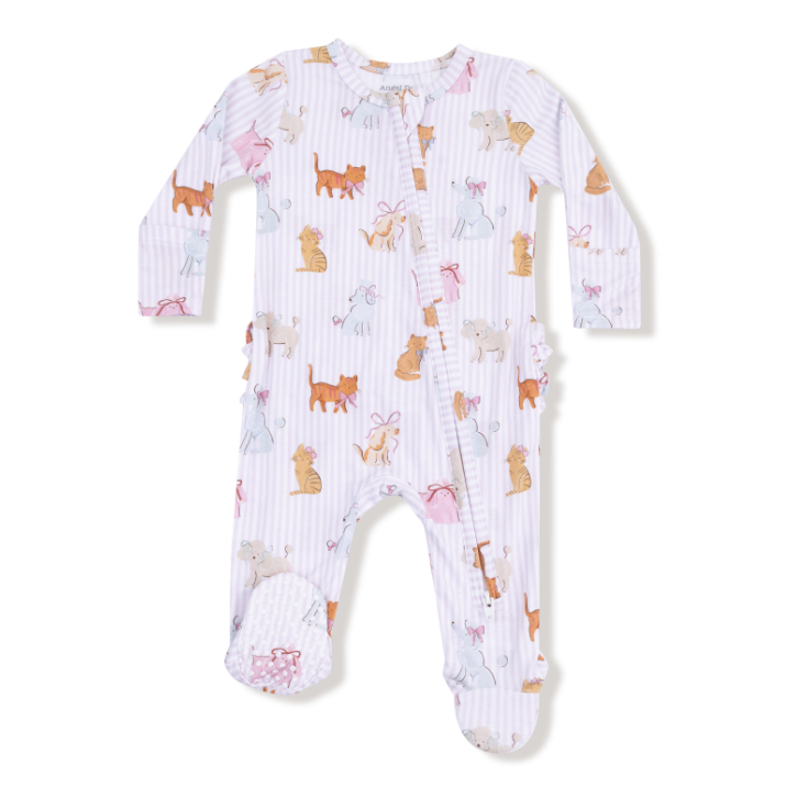 Baby onesie with animal pattern on a white background. Available at Be Charmed. 