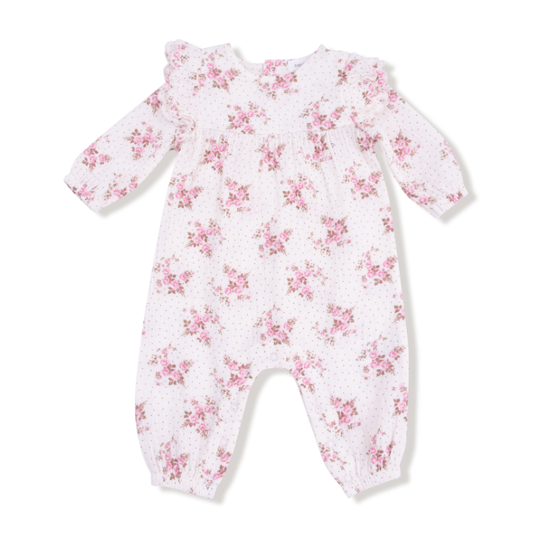 Floral-patterned baby onesie on a white background. Available at Be Charmed.