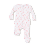 White baby onesie with pink star pattern on a white background. Available at Be Charmed
