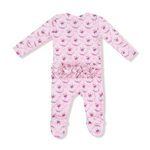 Pink baby onesie with floral pattern on a white background. Available at Be Charmed. 