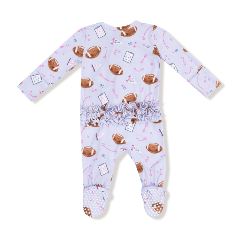 Baby girl onesie with lavander football pattern on a white background
