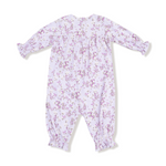 Floral-patterned baby romper on a white background. Available at Be Charmed. 