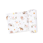 Baby blanket swaddle with farm animals and number pattern on a white background. Available at Be Charmed.  