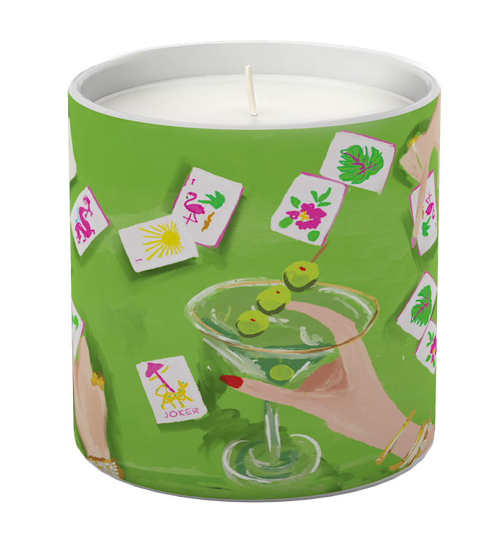 Candle in a green tin with a cocktail and card design on a white background. Available at Be Charmed