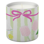 Candle in a decorative tin with a pink bow and striped design on a white background. Available at Be Charmed