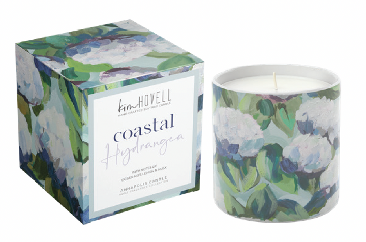Annapolis Candle – Kim Hovell Coastal Hydrangea boxed candle with blue floral artwork and refreshing floral scent, inspired by coastal living. Ideal for gifting or home décor. Available at Be Charmed.

