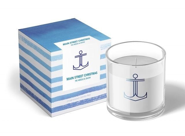 Annapolis Candle Main Street Christmas Signature Jar Candle featuring a festive blend of pine, cinnamon, and clove in a 8oz soy wax candle, available at Be Charmed