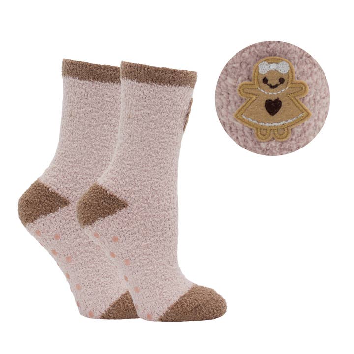 Aromasoles Fluffy Chenille Socks in gingerbread girl design and lavender-infused for cozy relaxation. Perfect seasonal gift. Available at Be Charmed.