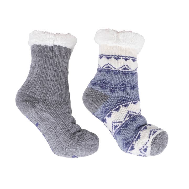 Pair of gray and blue patterned socks on a white background. Available at Be Charmed. 