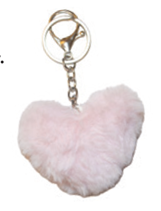 Heart-shaped pink fluffy keychain on a white background. Keychain comes with socks. 