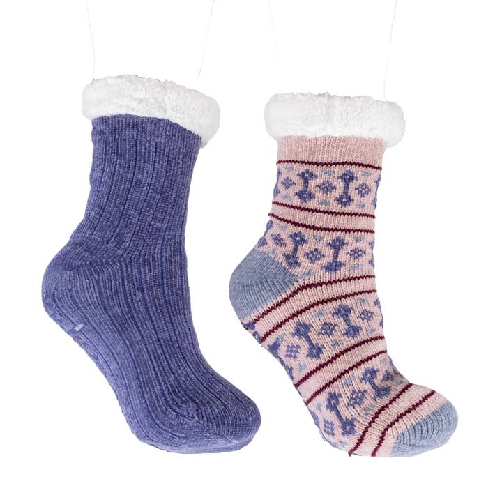 Two pairs of knitted socks, one blue and one pink with patterns, on a white background. Available at Be Charmed. 