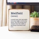 Rustic Marlin Medfield Humor Definition Wood Block pictured on a desk
