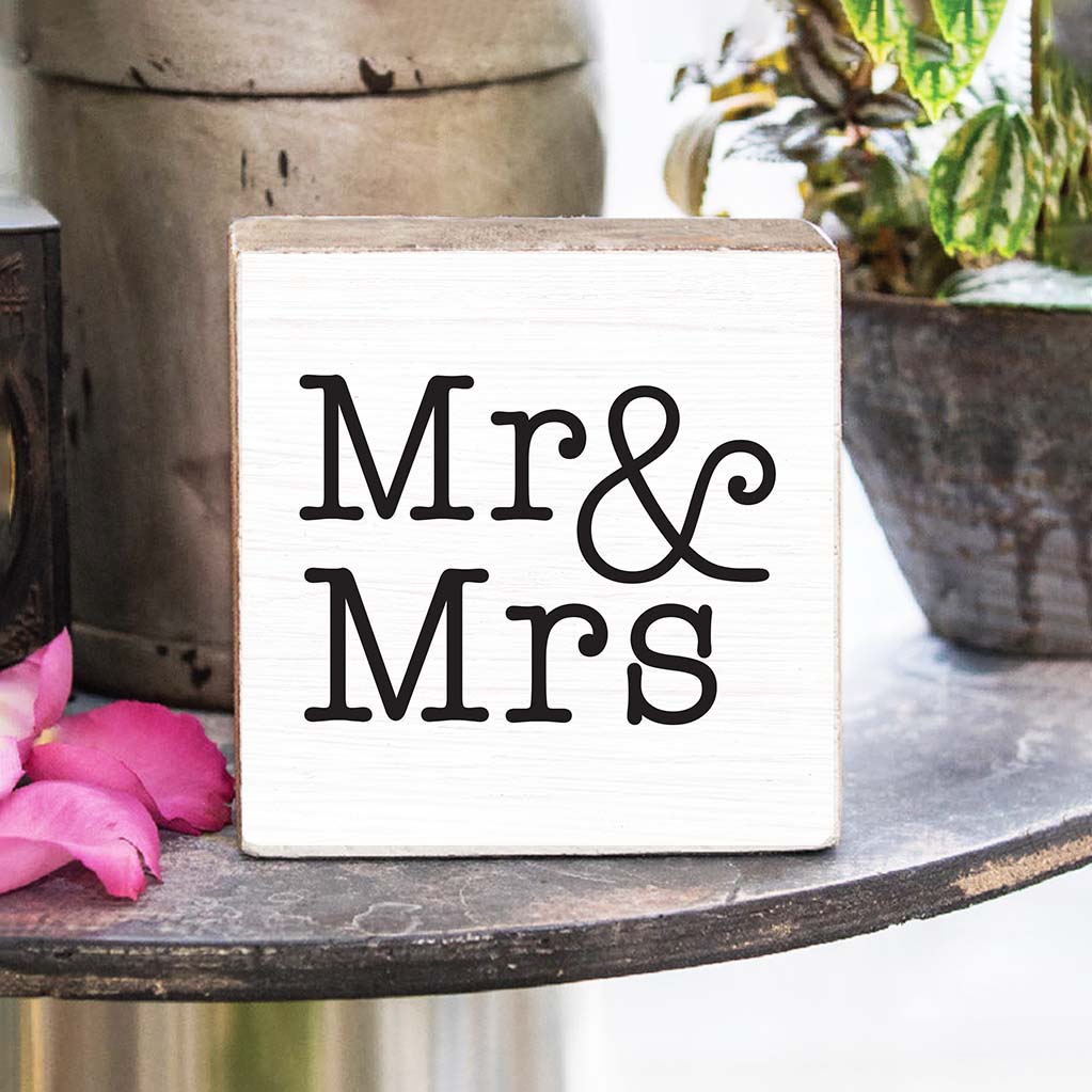 Rustic Marlin Mr. & Mrs. Decorative Wooden 6 x 6 Block sitting on table with flowers