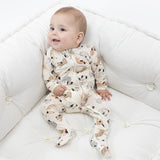 Baby wearing Angel Dear Cozy Pups 2-Way Zipper Footie with soft fabric and playful puppy print, available at Be Charmed.