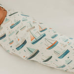 Baby swaddled in Copper Pearl Fischer Knit Swaddle Blanket – Soft, breathable, and perfect for newborns to toddlers. Available at Be Charmed.