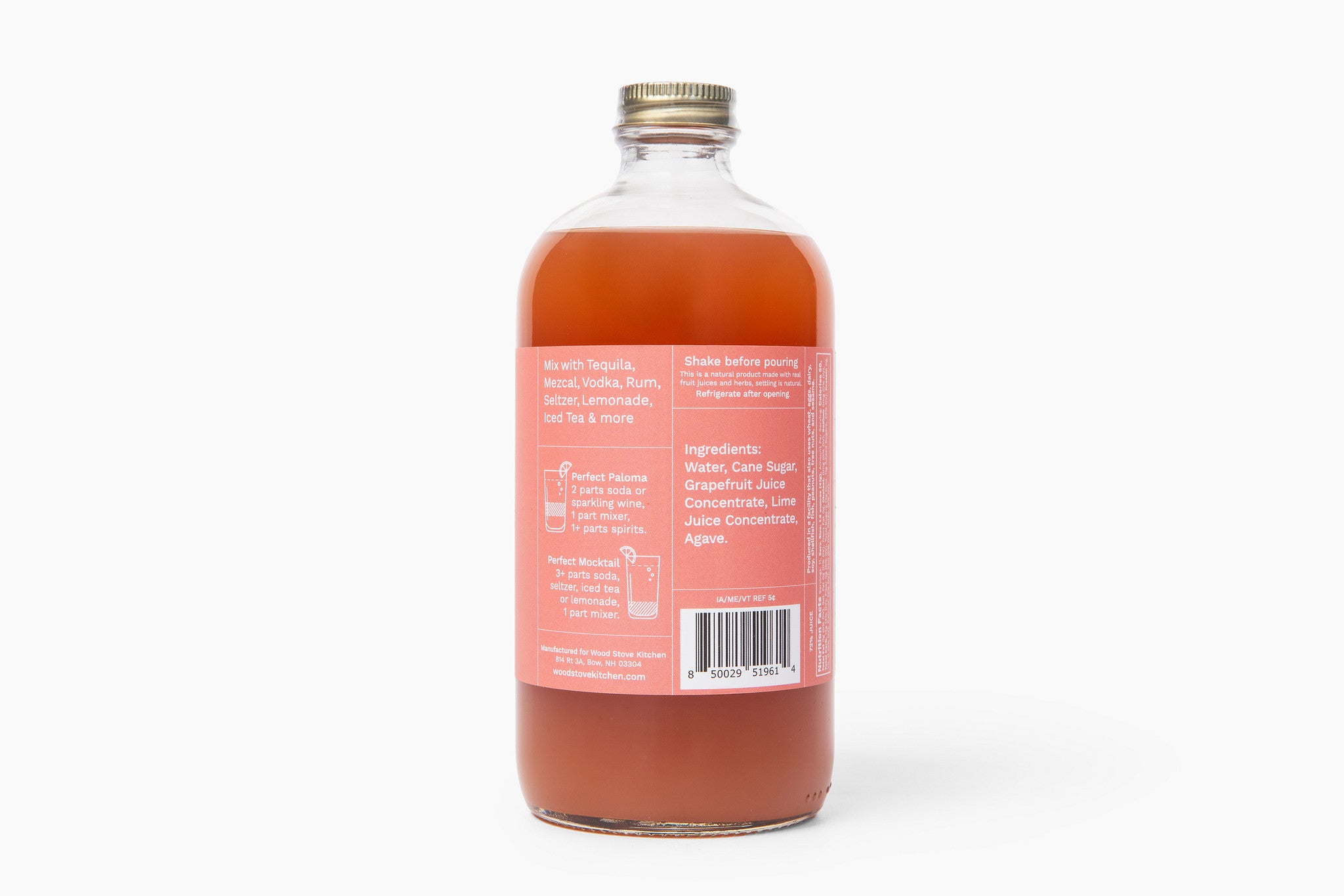 Clear glass bottle with a red liquid label on a white background. Available at Be Chamred