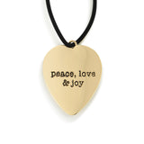 Back of Demdaco Peace Love Joy heart bottle tag decorative stopper, resin festive design—Available at Be Charmed