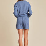 Back view of Barefoot Dreams Malibu Collection slub double-knit short in Lakeside blue, elastic waist and side pockets, available at Be Charmed.