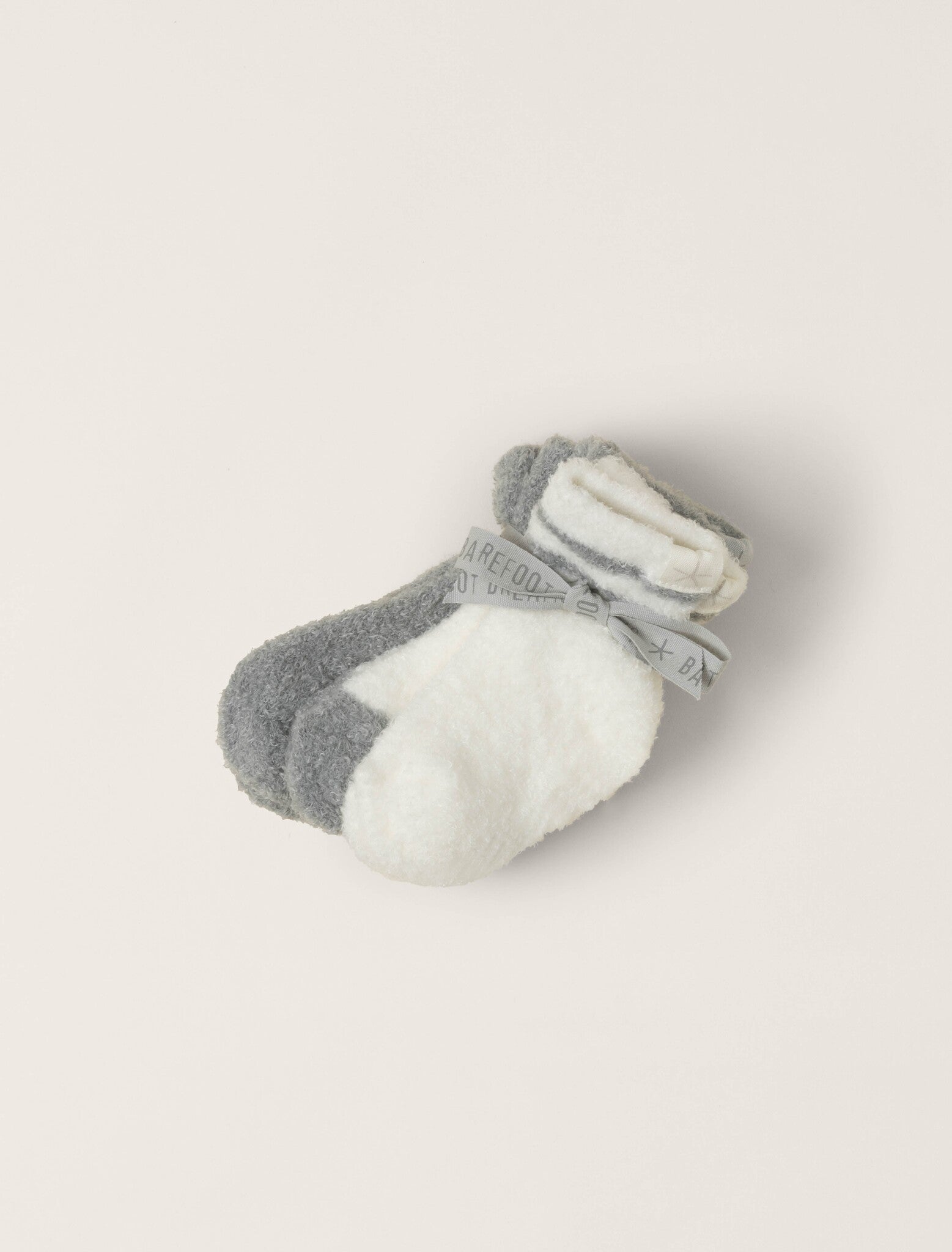 Set with bow of Moonbeam/Pearl CozyChic Lite Infant 3‑Pack Socks by Barefoot Dreams, soft baby crew socks set, available at Be Charmed