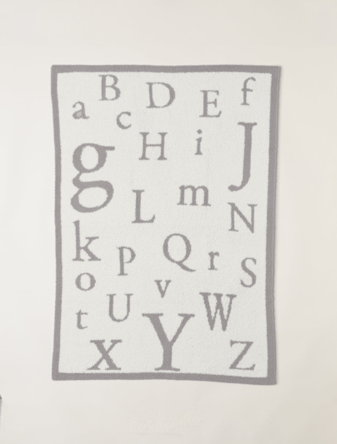 CozyChic ABC Blanket in Oyster/Cream by Barefoot Dreams, ultra-soft alphabet-print baby blanket, available at Be Charmed