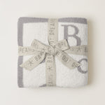 Tied with Ribbon CozyChic ABC Blanket in Oyster/Cream by Barefoot Dreams, ultra-soft alphabet-print baby blanket, available at Be Charmed