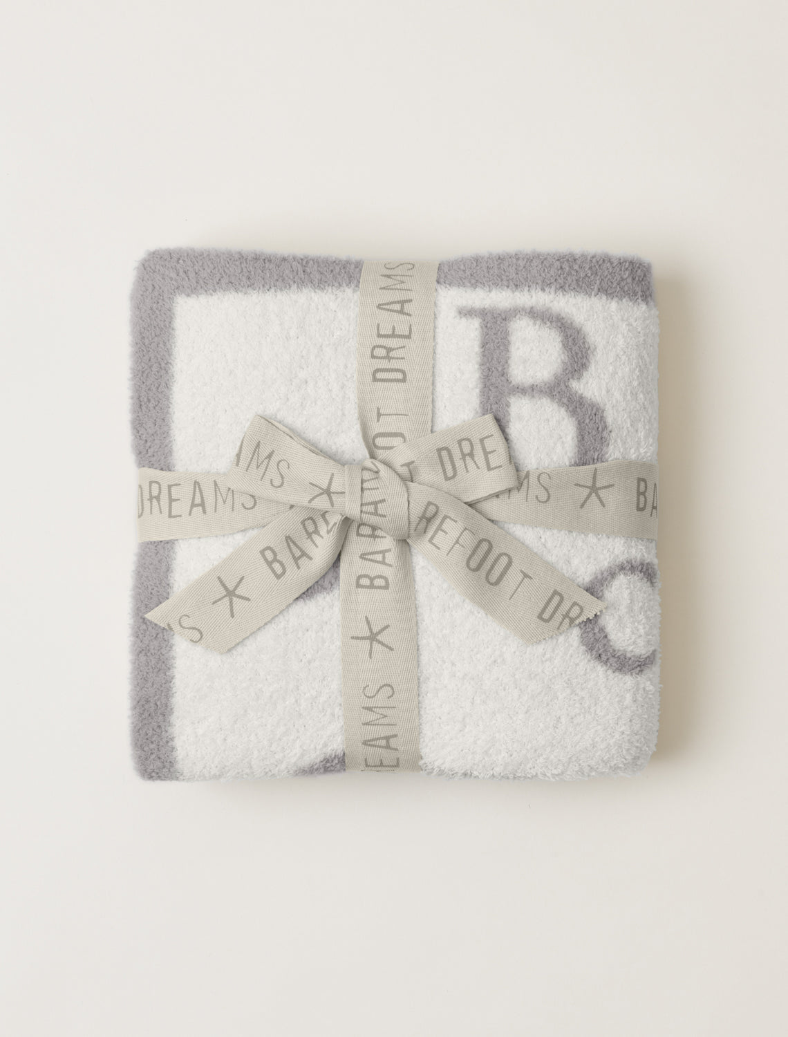 Tied with Ribbon CozyChic ABC Blanket in Oyster/Cream by Barefoot Dreams, ultra-soft alphabet-print baby blanket, available at Be Charmed