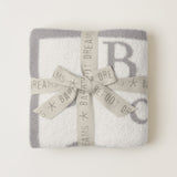Tied with Ribbon CozyChic ABC Blanket in Oyster/Cream by Barefoot Dreams, ultra-soft alphabet-print baby blanket, available at Be Charmed