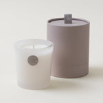 Sandalwood Candle by Barefoot Dreams, warm woody fragrance, available at Be Charmed