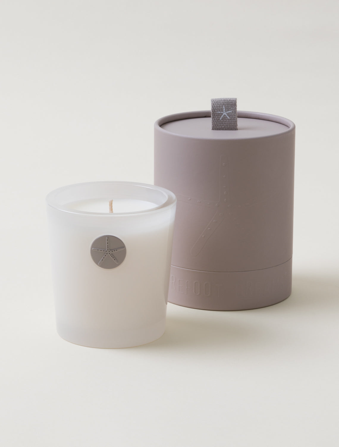 Sandalwood Candle by Barefoot Dreams, warm woody fragrance, available at Be Charmed