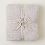 Barefoot Dreams CozyChic Stone Throw — ultra-soft, breathable luxury blanket for home or gifting. Available at Be Charmed