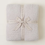 Barefoot Dreams CozyChic Stone Throw — ultra-soft, breathable luxury blanket for home or gifting. Available at Be Charmed