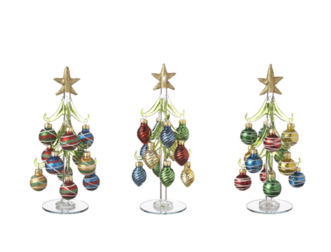 An 8-inch hand-blown Ganz glass Christmas tree with colorful miniature ornaments and a mirrored base. Available at Be Charmed